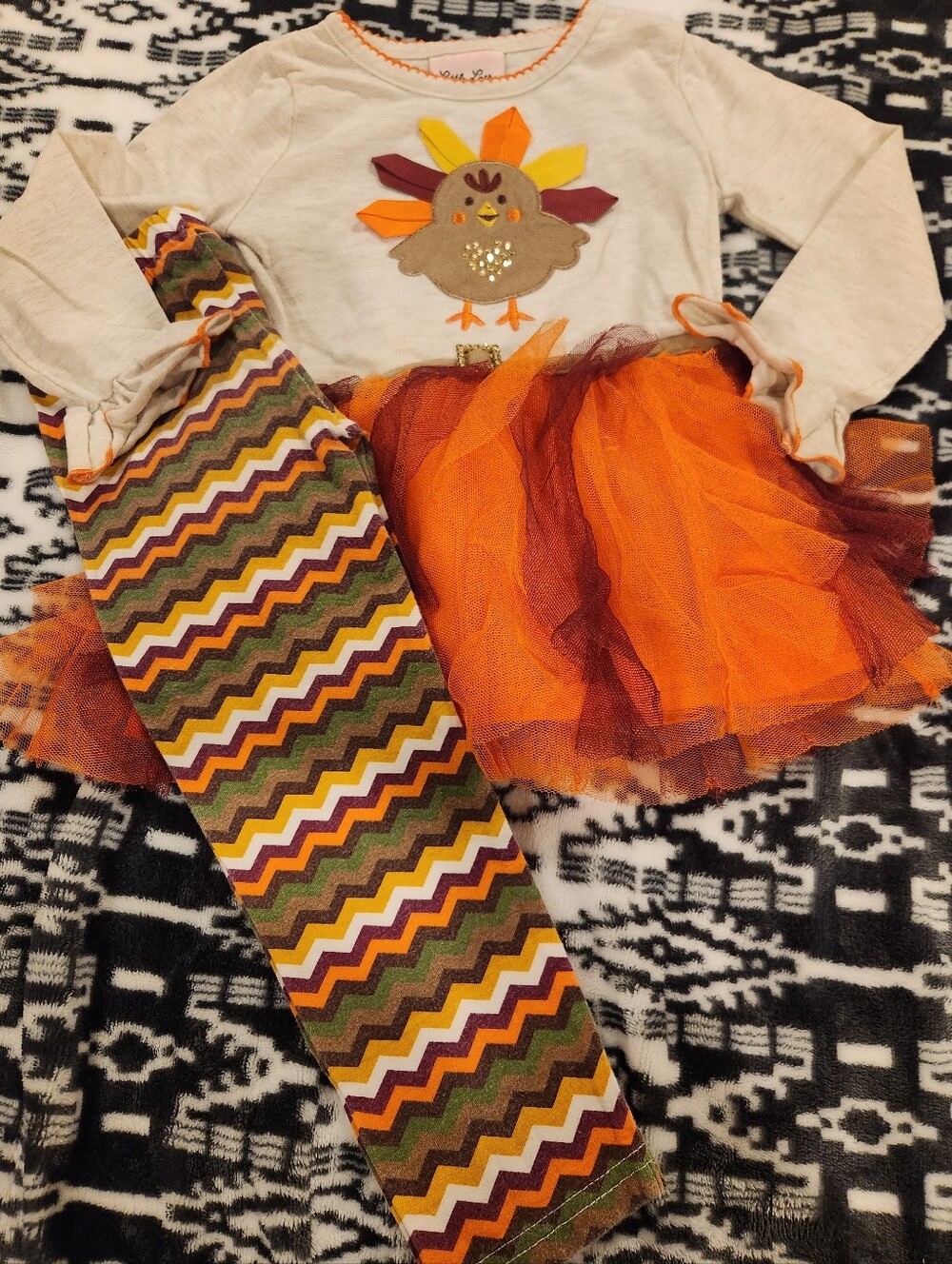 Little Lass Cream Top with Orange Tulle Skirt and Multi Chevron Pants, Size 3T
